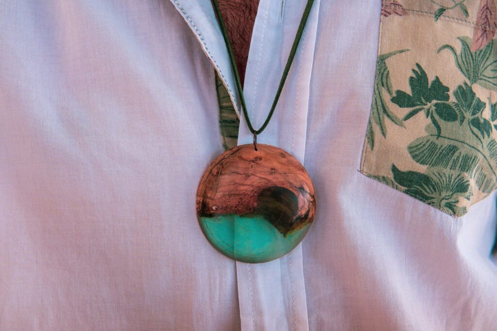 green and brown round pendant